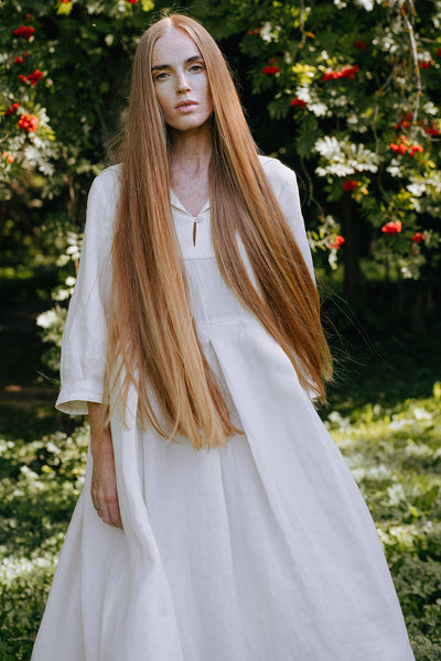 Long hair girl in a milky white hemp dress by Son de Flor